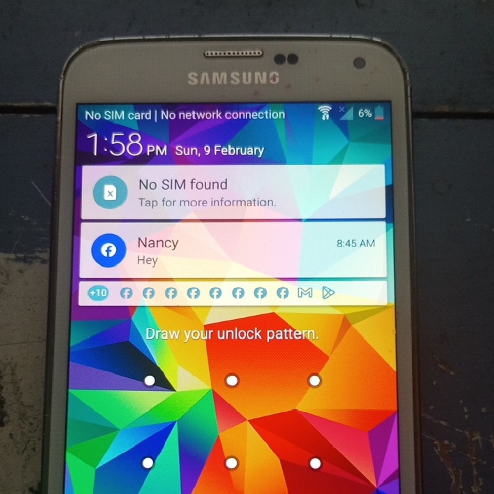 Samsung Gray Smartphone with Colorful Display and Front-Facing Camera